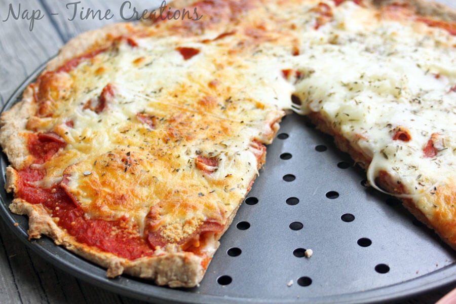 Whole Wheat Pizza Crust... the perfect recipe. Pizza with a slice removed.